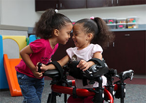 Lansing medical malpractice lawyer discusses how assistive devices can help children with cerebral palsy bond with others.